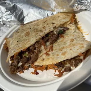 Flour Quesadillas with carne asada.