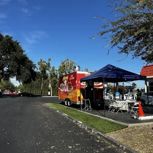 a food truck parked on the side of the road