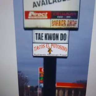 a sign for tacos el potosino