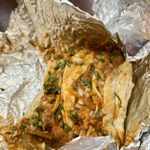 a burrito wrapped in foil