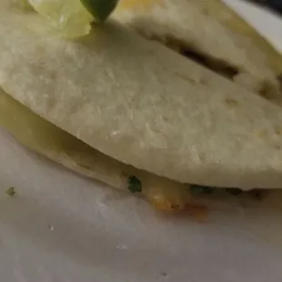 a close up of a taco