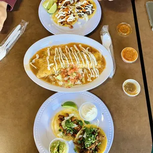  two plates of food on a table