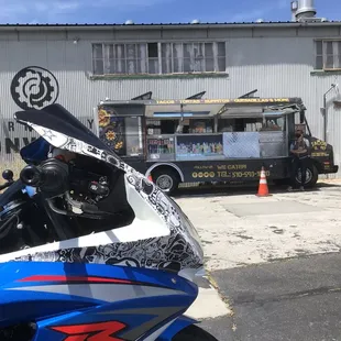 a motorcycle parked in front of a building