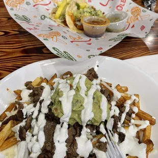 2 tacos, queso fries