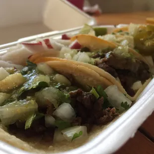 Carbs asada tacos, everything on them, mild salsa
