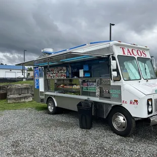 a taco truck parked in a parking lot