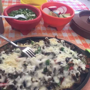 Alhambre (basically cheese covered fajitas). I recommend.