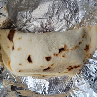 Carne guisada with cheese taco
