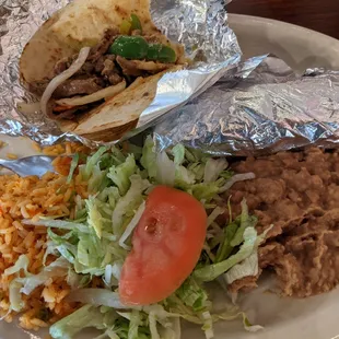 Jalisco combination - one chicken and one beef taco. With the fixin&apos;s