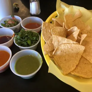 You can munch on chips and several kinds of salsas while you wait for your food.  The orange one is extra spicy probably has habanero.
