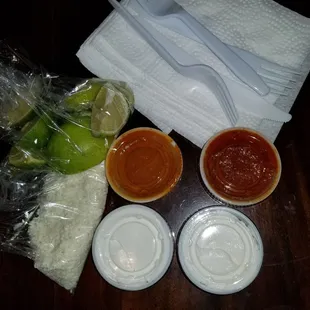 Sides of cotjia cheese, limes, the expensive sour cream and hot sauce