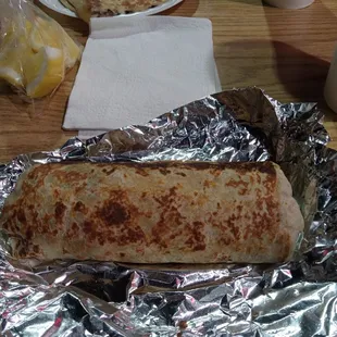 Got a burrito of Carne asada,quesadilla of Carne asada,tacos de tripas and a couple of grilled jalapeños on the side.