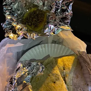 a tortilla wrapped in tin foil