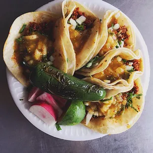 Tacos  we have asada, al pastor, chicken, chorizo, and cabeza