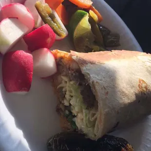 Burrito Super: beans, rice, choice of meat, cilantro, onion, hot salsa, cheese, sour cream and lettuce