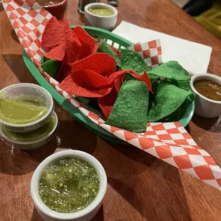 Chips with an assortment of salsas.