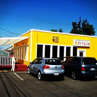 two cars parked in a parking lot