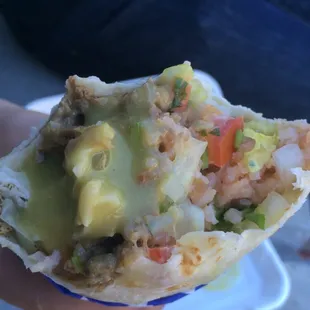 Burrito with green salsa