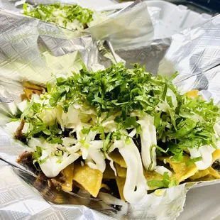 Chilaquiles w/ green tomatillo sauce