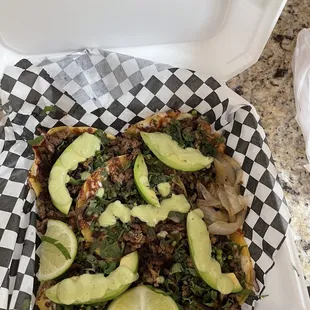 asada mini tacos with melted cheese and avocado (i asked for only grilled onion)