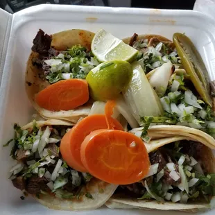 5 taco plate, 2 lengua, 3 barbacoa. Delicious!
