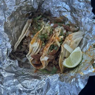 Carne asada and al pastor tacos