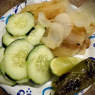 sliced cucumbers and pickles on a plate