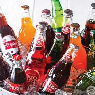 a bucket full of sodas