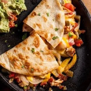 two quesadillas and guacamole