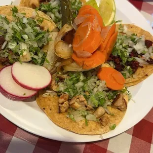 Chorizo, carnitas and grilled chicken tacos