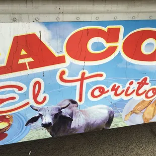 a sign for tacos el torito