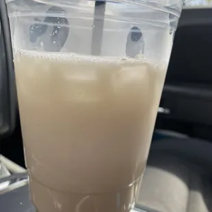 a drink in a plastic cup