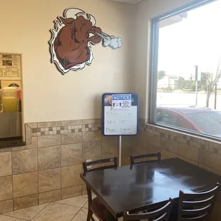 a table and chairs in a restaurant