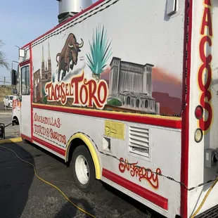 a taco truck parked in a parking lot