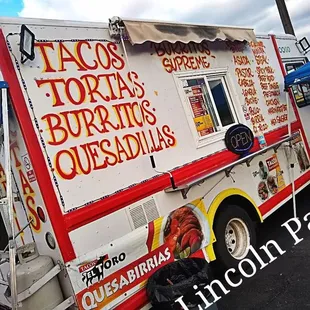 a food truck parked in a parking lot