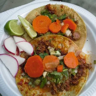 El pastor and chorizo tacos.