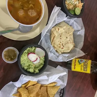 Beef and vegetable soup, side serving guacamole