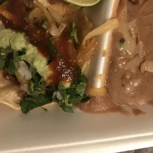 Carne Assad's taco with amazing refried beans. Delicious!!!