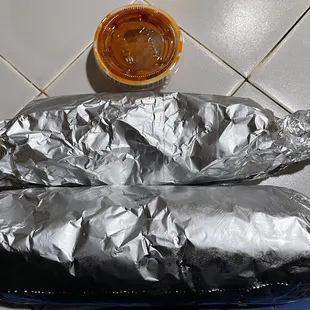 Top - $7 bean & cheese burrito. Bottom - super burrito...slightly bigger than the bean one & cost $14.  Over priced for what u get.