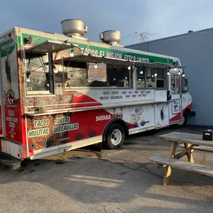 a food truck parked in a parking lot