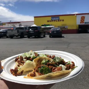 Tacos trailer next to Amigo Tire