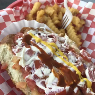 Hotdog with French fries.