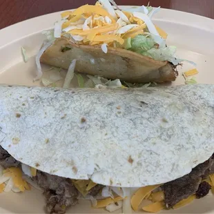 Fridays special soft taco and a crispy shredded beef taco