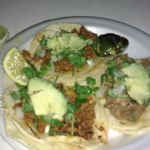 Tacos de Pastor, asada, and vapor (brisket)