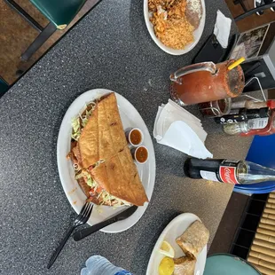 Michelada, Chilaquiles with rice and beans plate, flour taco and breakfast burrito.