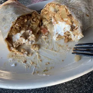 Chorizo potato burrito with cream added