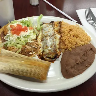 Combination dinner. Three Mexican... Umm... Things. I&apos;m not good with knowing what this stuff is.