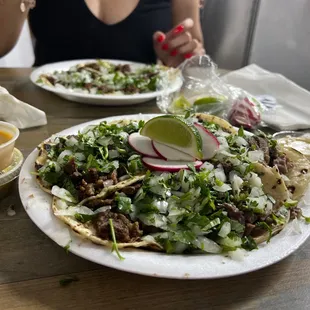 a woman eating a taco