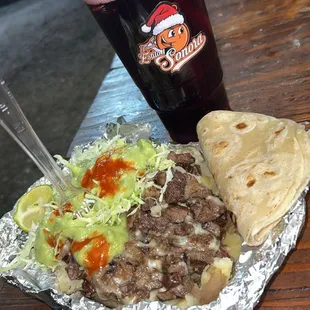 Una papa  de carne  asada ‍