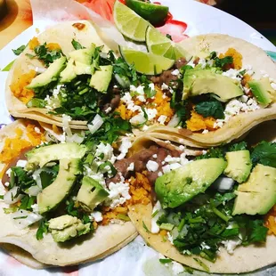 Vegetarian Tacos- cilantro, onions, cotija, rice, beans, &amp; avocados (substitute the meat with rice, beans, &amp; avocados- special request)